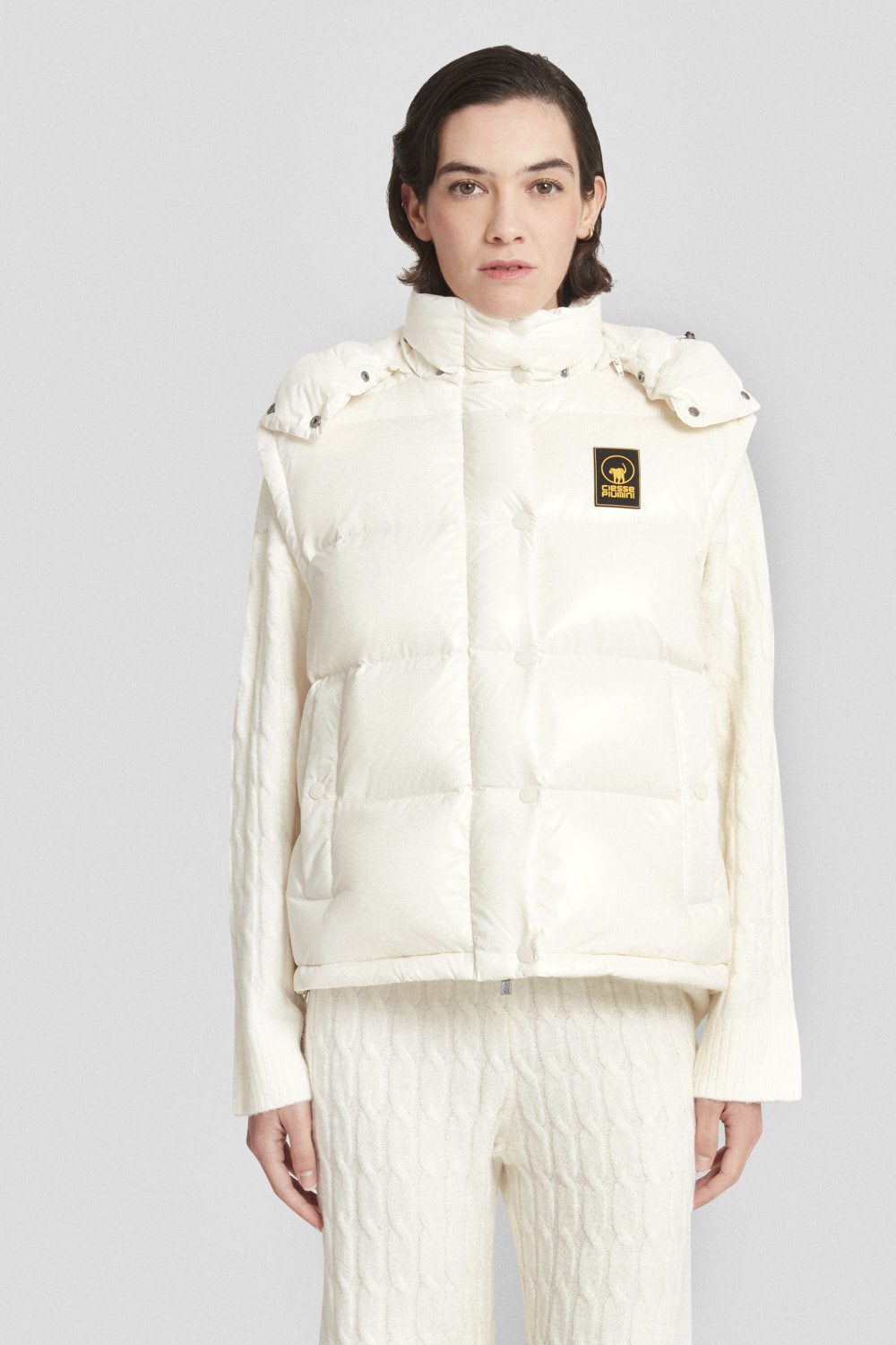 Piumino Ciesse trapuntato bianco con cappuccio e maniche staccabili