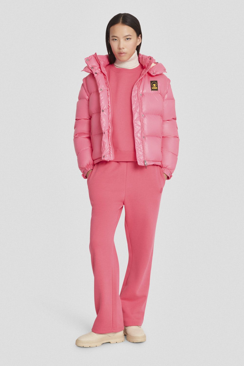 Piumino Ciesse trapuntato fucsia con cappuccio e maniche staccabili