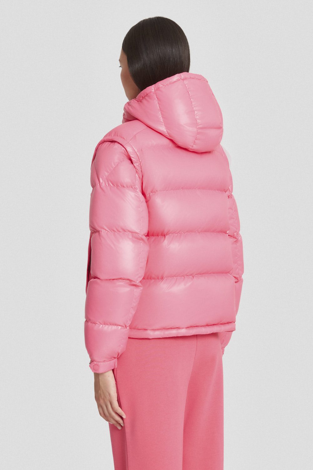 Piumino Ciesse trapuntato fucsia con cappuccio e maniche staccabili