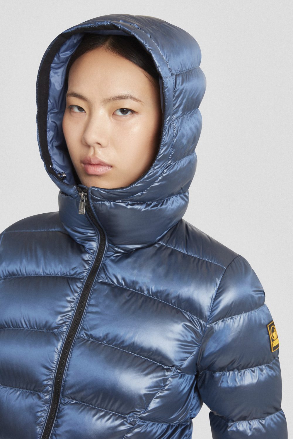 Piumino Ciesse azzurro con cappuccio